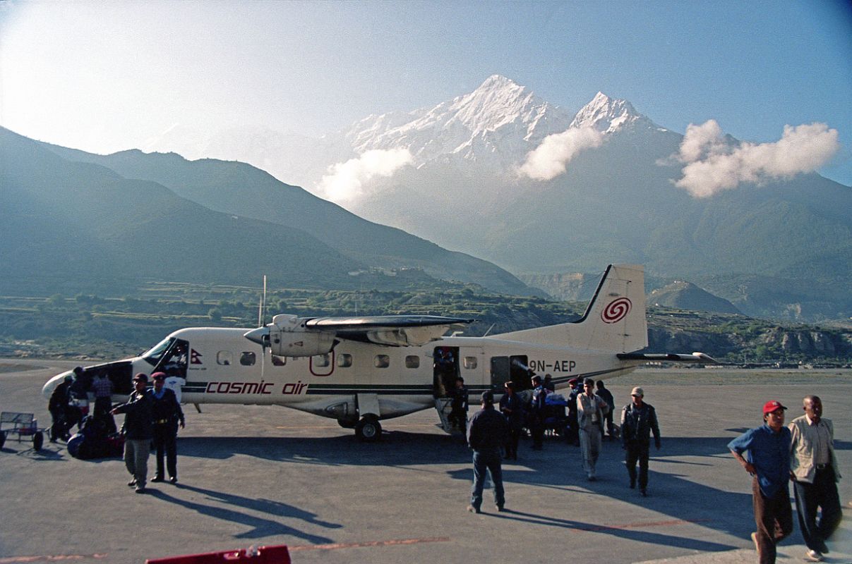 10 Deplaning At Jomsom Airport With Nilgiri North Behind 